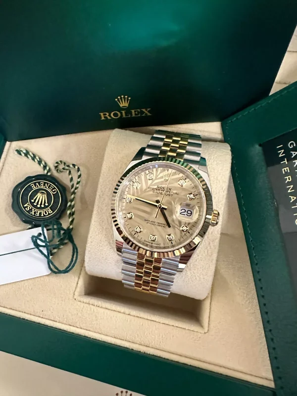 Rolex  Datejust 36mm 126233 Champagne Palm Motif Diamond Dial and Jubilee Bracelet Watch