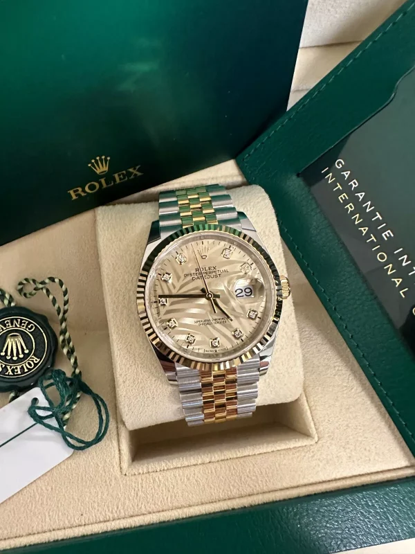 Rolex  Datejust 36mm 126233 Champagne Palm Motif Diamond Dial and Jubilee Bracelet Watch
